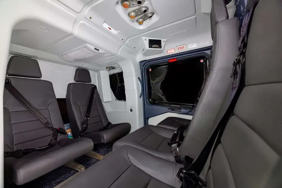 Leather cabin of a private helicopter charter from Budapest Airport